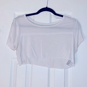 Super cropped white shirt from urban outfitters. Size small.